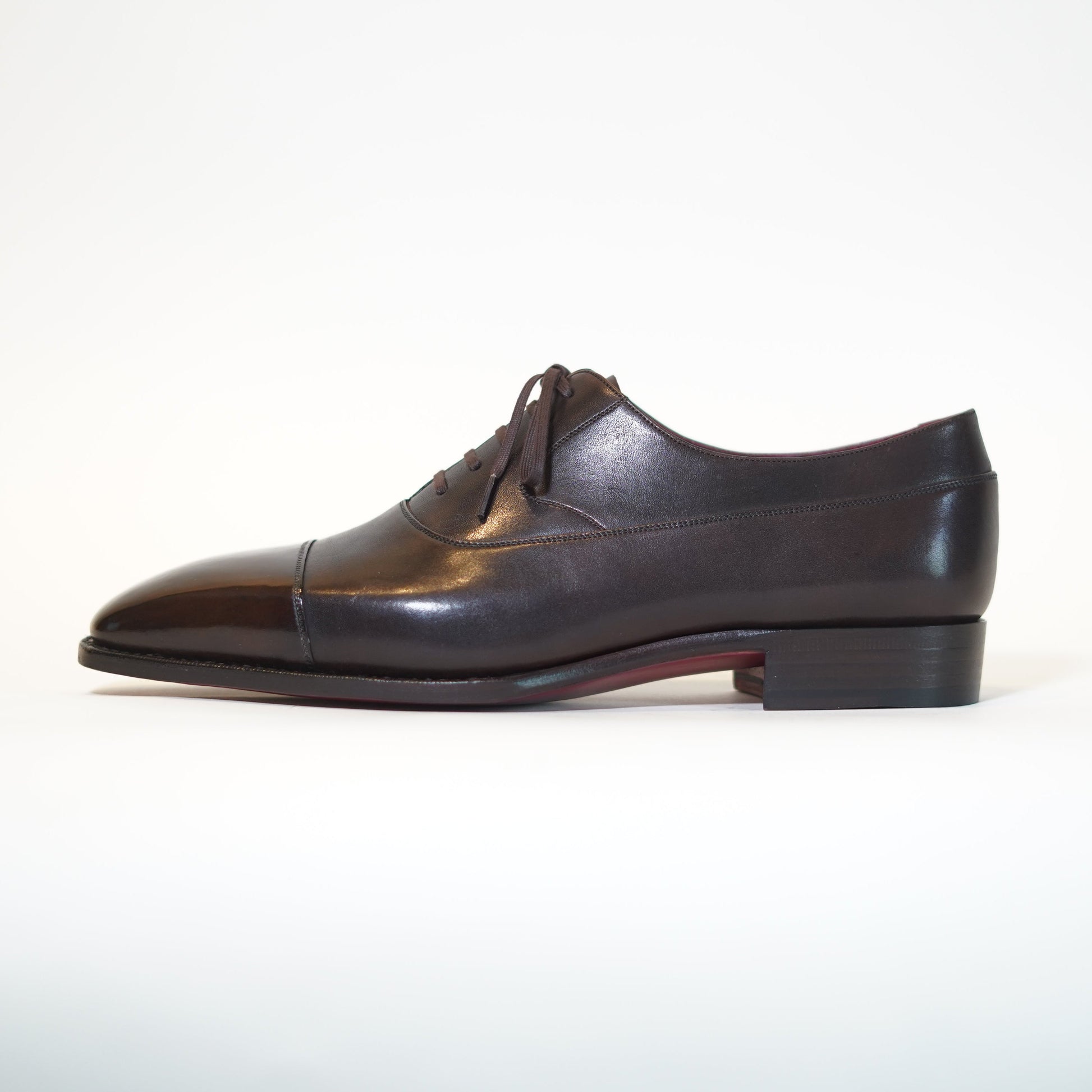 MANGO MOJITO Balmoral Oxford dress shoe in dark brown leather with a soft chisel toe and elegant side profile.